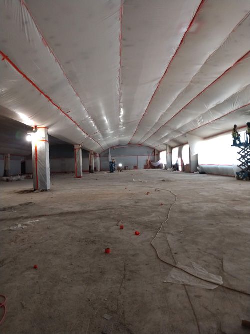 Large industrial space prepared for asbestos abatement by Peak Environmental in Denver